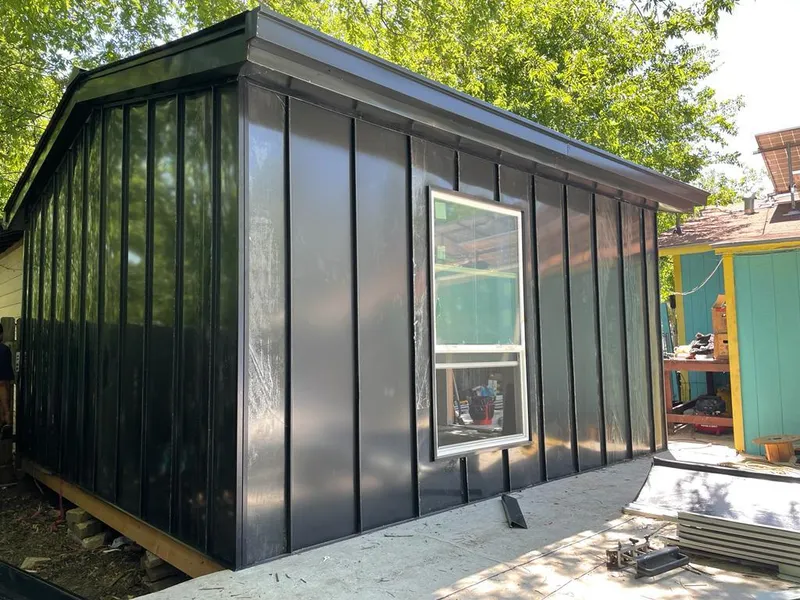 Black standing seam metal wall panels for Metal Roof Installation in Presque Isle