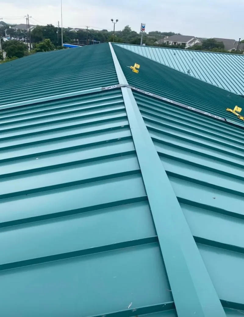 Green commercial metal roof ridge and valley for Metal Roof Repair in Presque Isle